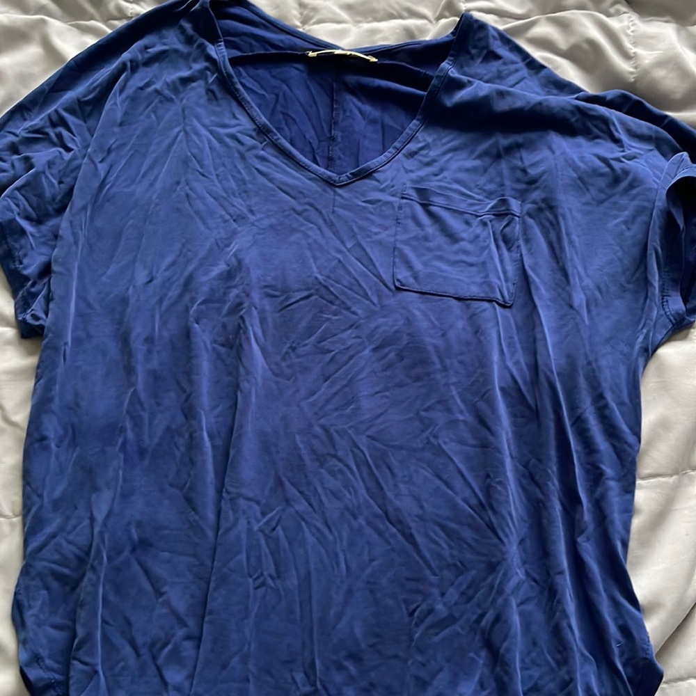 Sorry about the wrinkles lol. But this is a super comfy shirt and flowy. Size L.